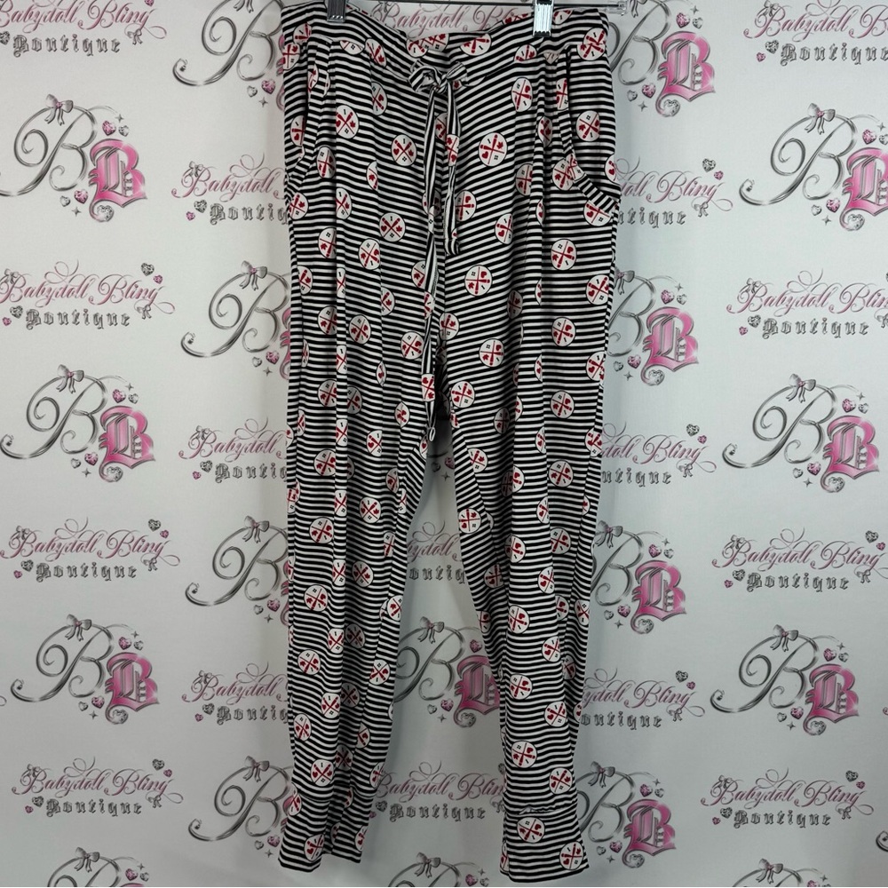 True north pants pj I heart Canada 🇨🇦 Chic Striped Pants with Floral Accents